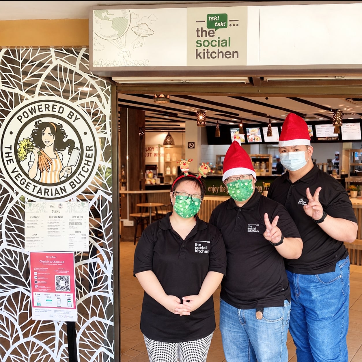 Three team members wearing black shirts at The Social Kitchen’s former Jurong Bird Park outlet